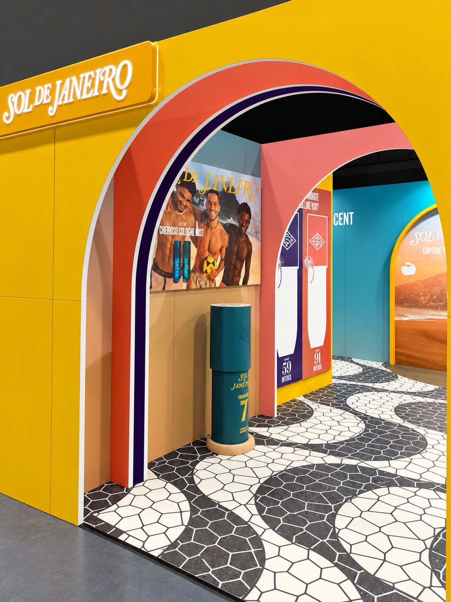 Angled view of the yellow beauty exhibition stand and layered arch construction