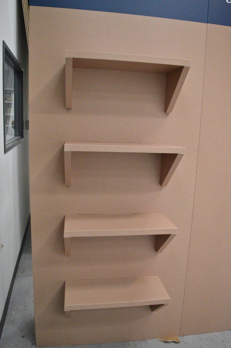 Stephensons shelving, printed headers and stand components