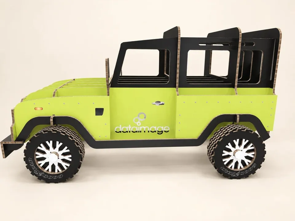 Vehicle replica with cut board profiles and layered wheels