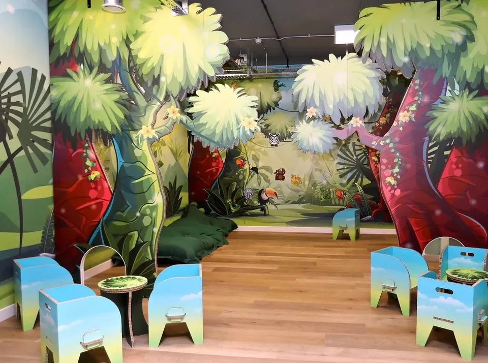 Soo Yoga children’s studio with shaped trees, wall graphics and furniture