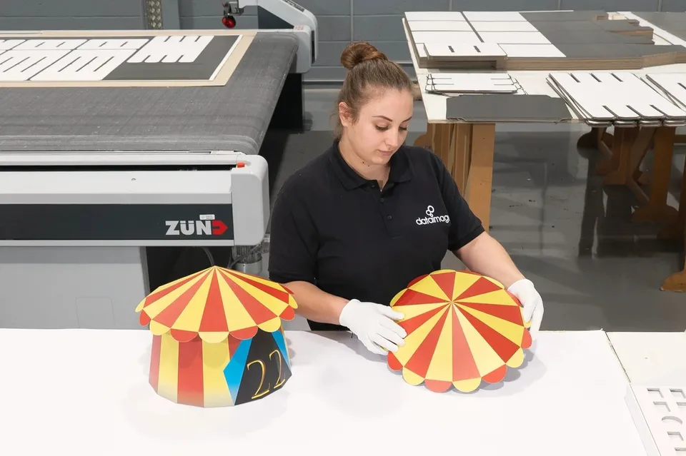 Hand assembly of printed dimensional display forms