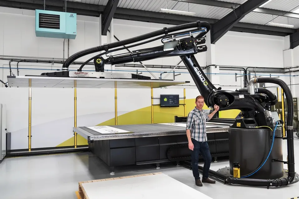 Robotic handling and cutting equipment on the production floor