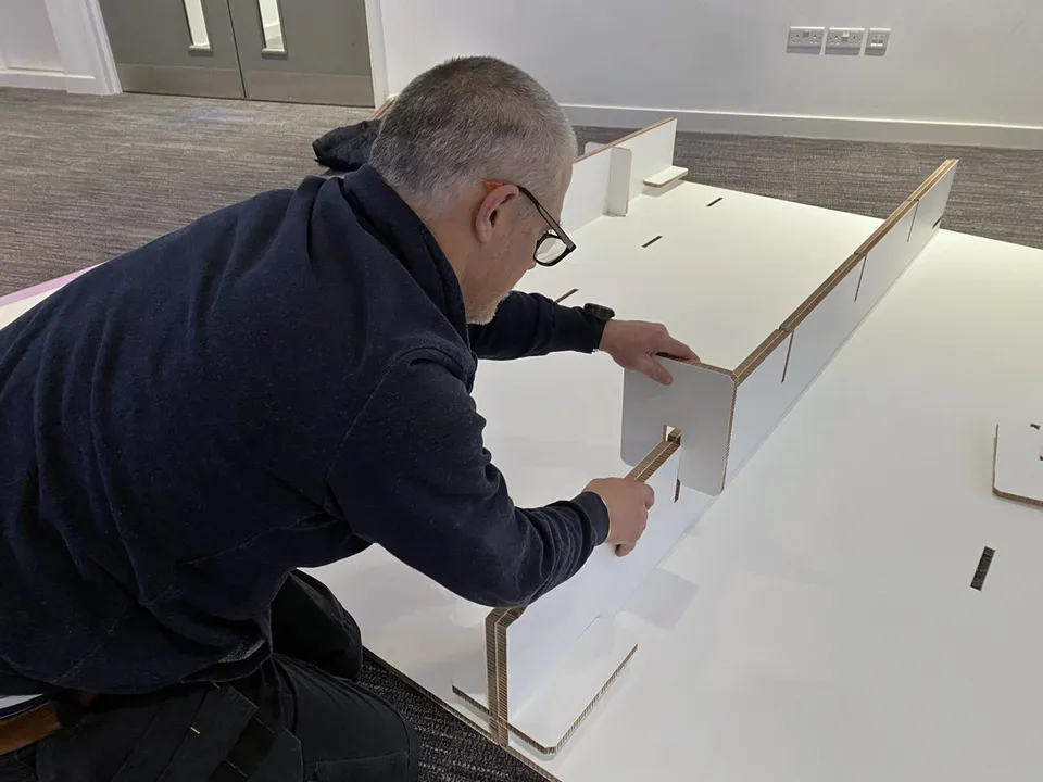 Stephensons shelving, printed headers and stand components