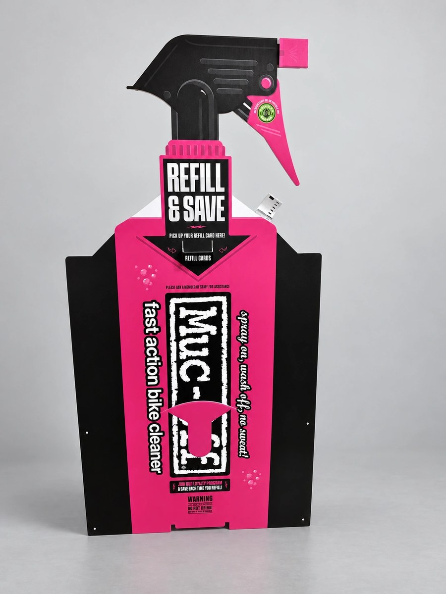 Oversized Muc-Off spray-pack factice and refill-card display