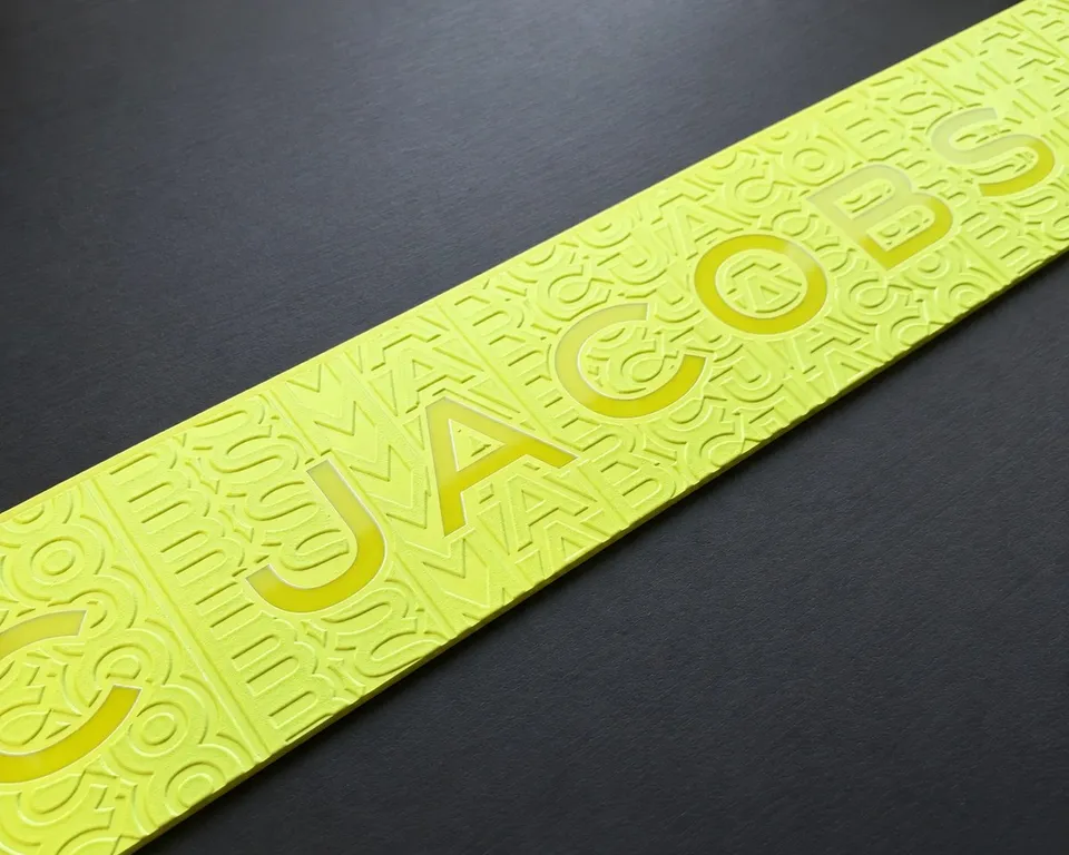 Raised lettering and pattern in a bright tactile print sample