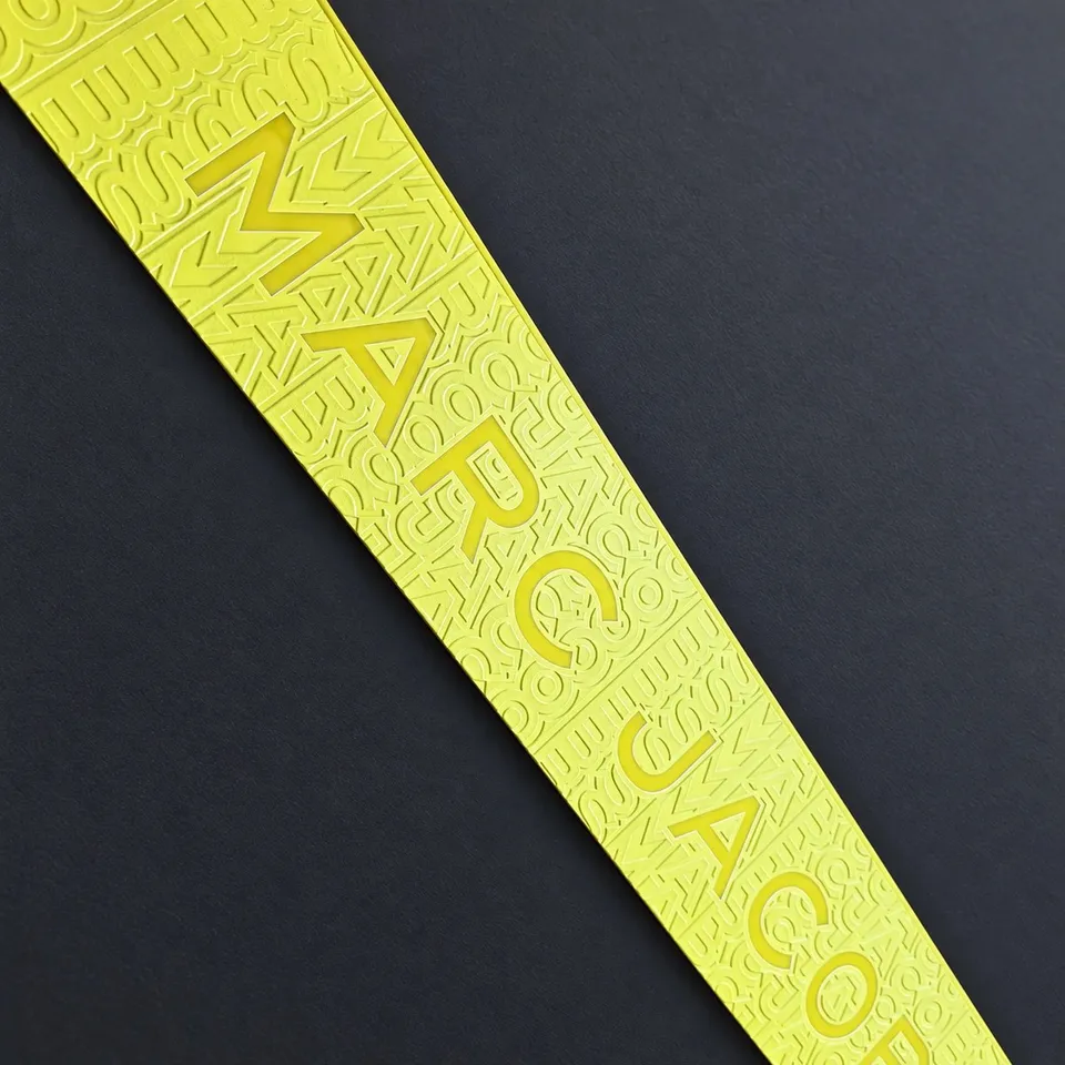 Tactile lettering detail showing printed relief
