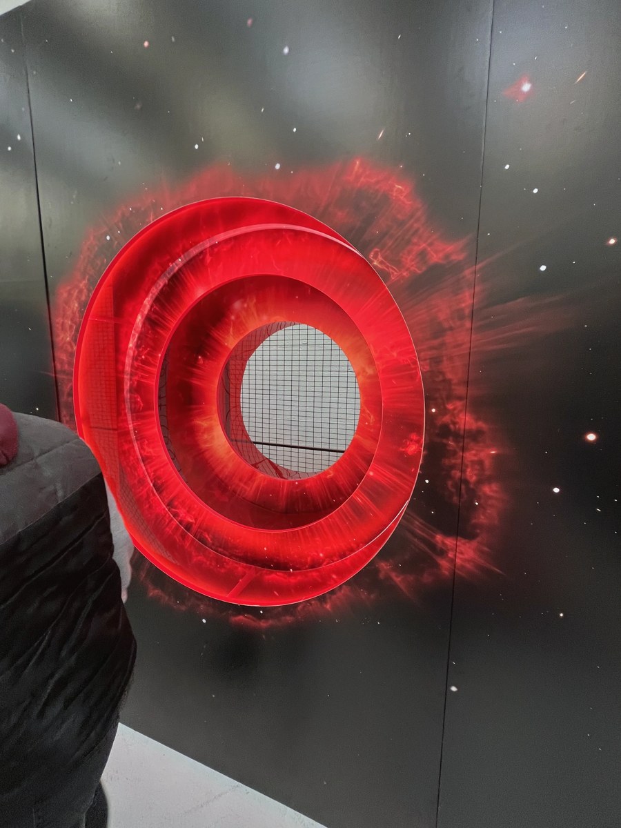 Projecting circular portal rings on a rectangular printed backdrop