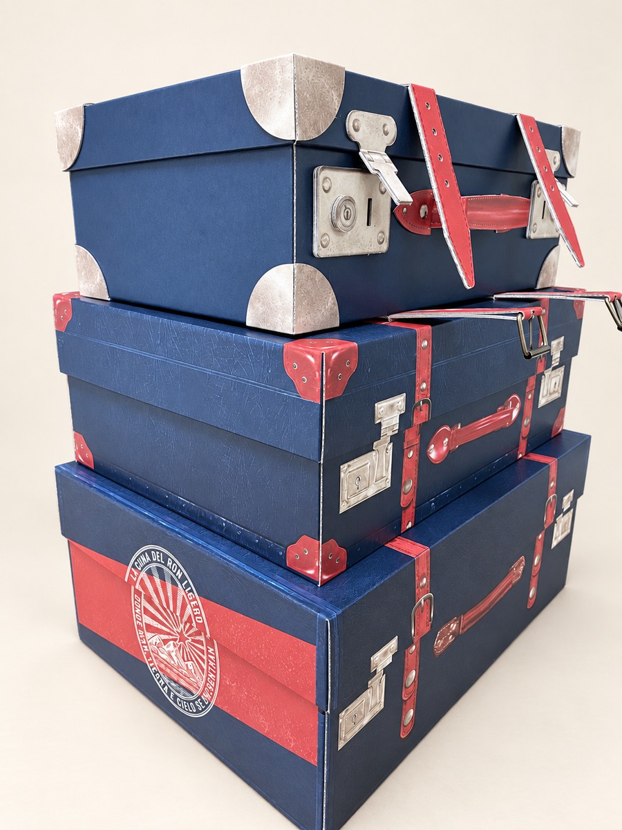 Don Papa suitcase-shaped display with printed straps and corner details