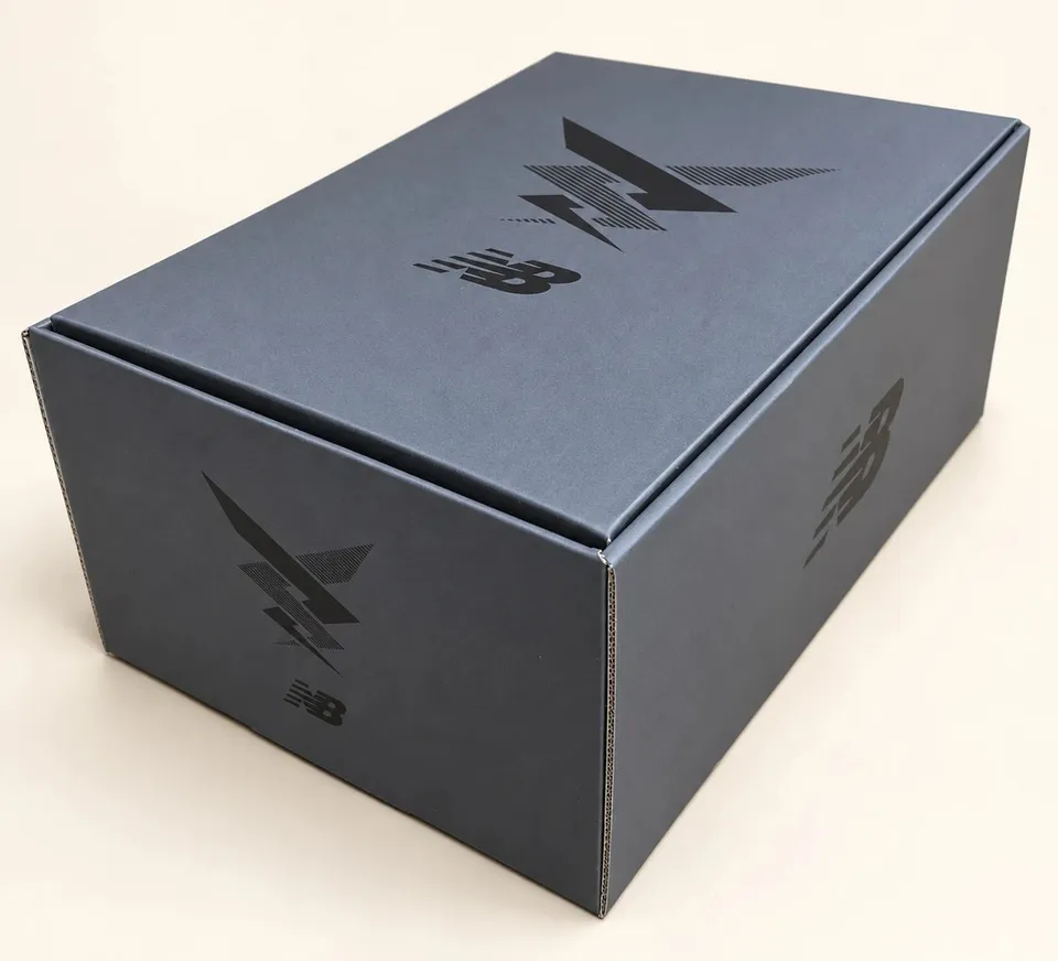 Branded presentation box with printed surfaces