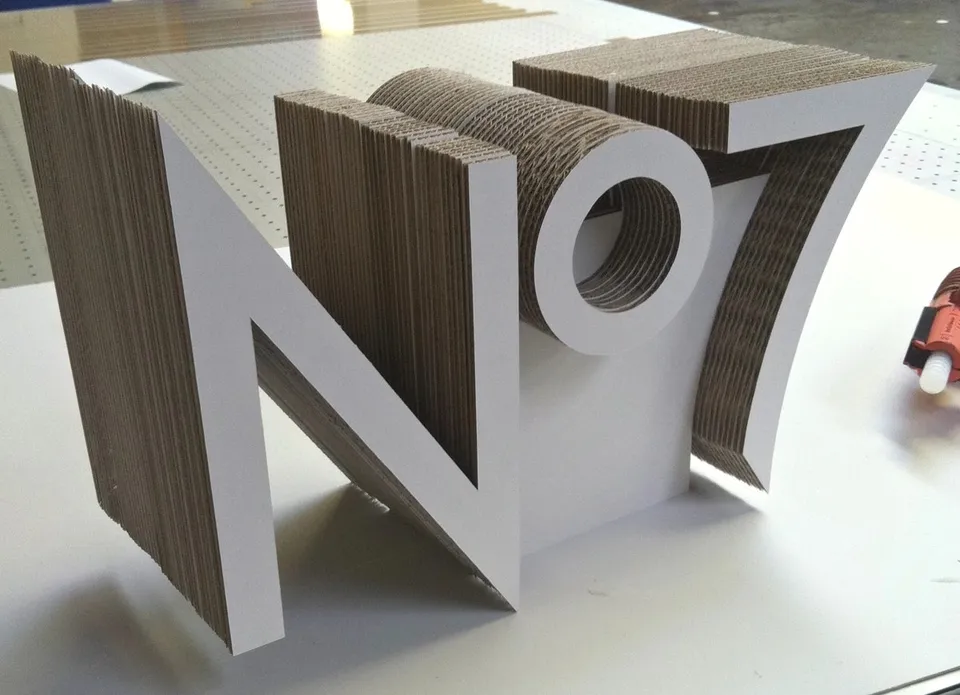 Layered No7 dimensional lettering with exposed board edges