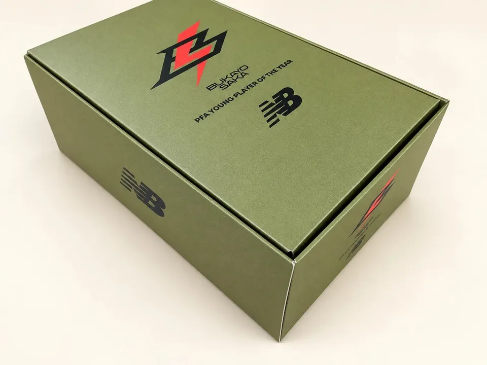 Branded presentation box with printed surfaces