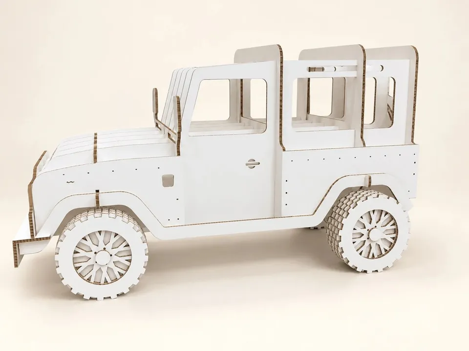 Vehicle replica with cut board profiles and layered wheels