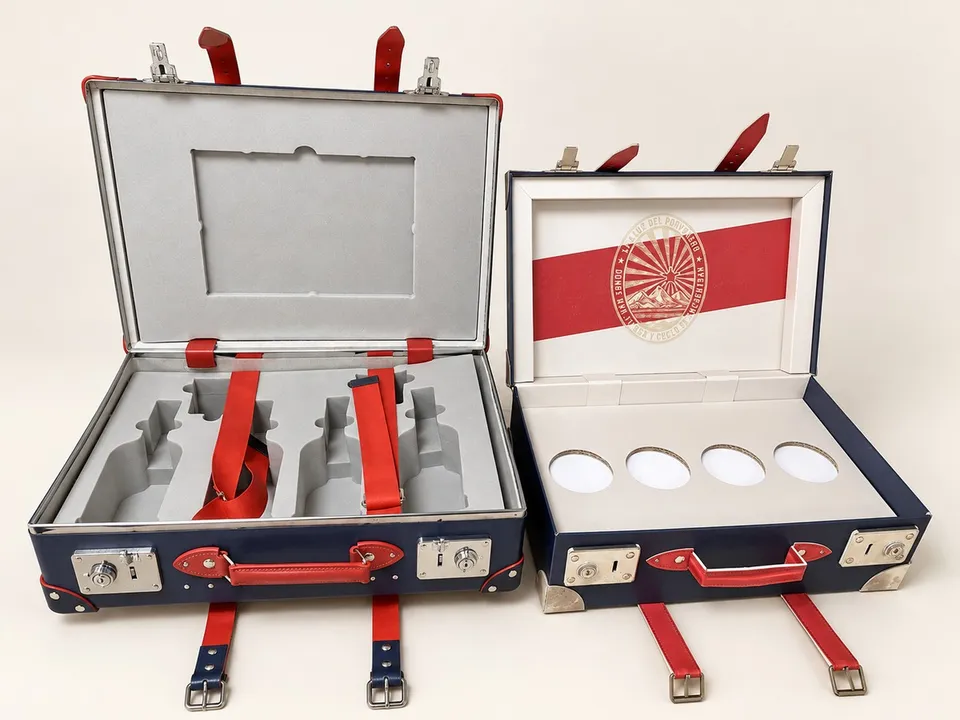 Don Papa suitcase-shaped display with printed straps and corner details