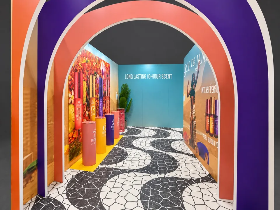 Interior archway framing the product display wall and patterned floor