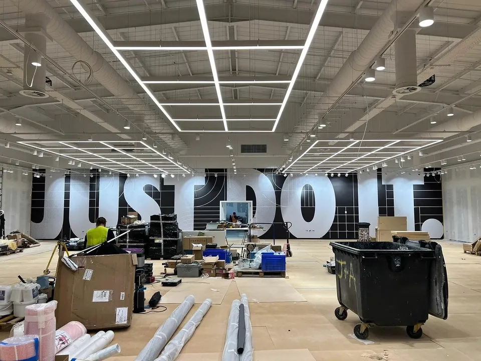 Nike retail interior during the store graphics installation