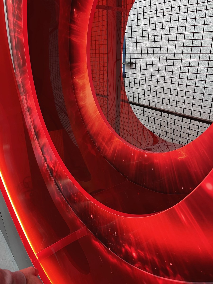 Projecting circular portal rings on a rectangular printed backdrop