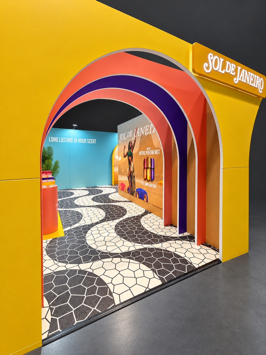View through the layered arches towards the interior campaign graphics