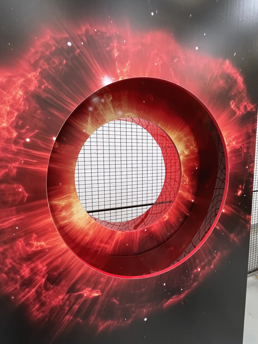 Projecting circular portal rings on a rectangular printed backdrop